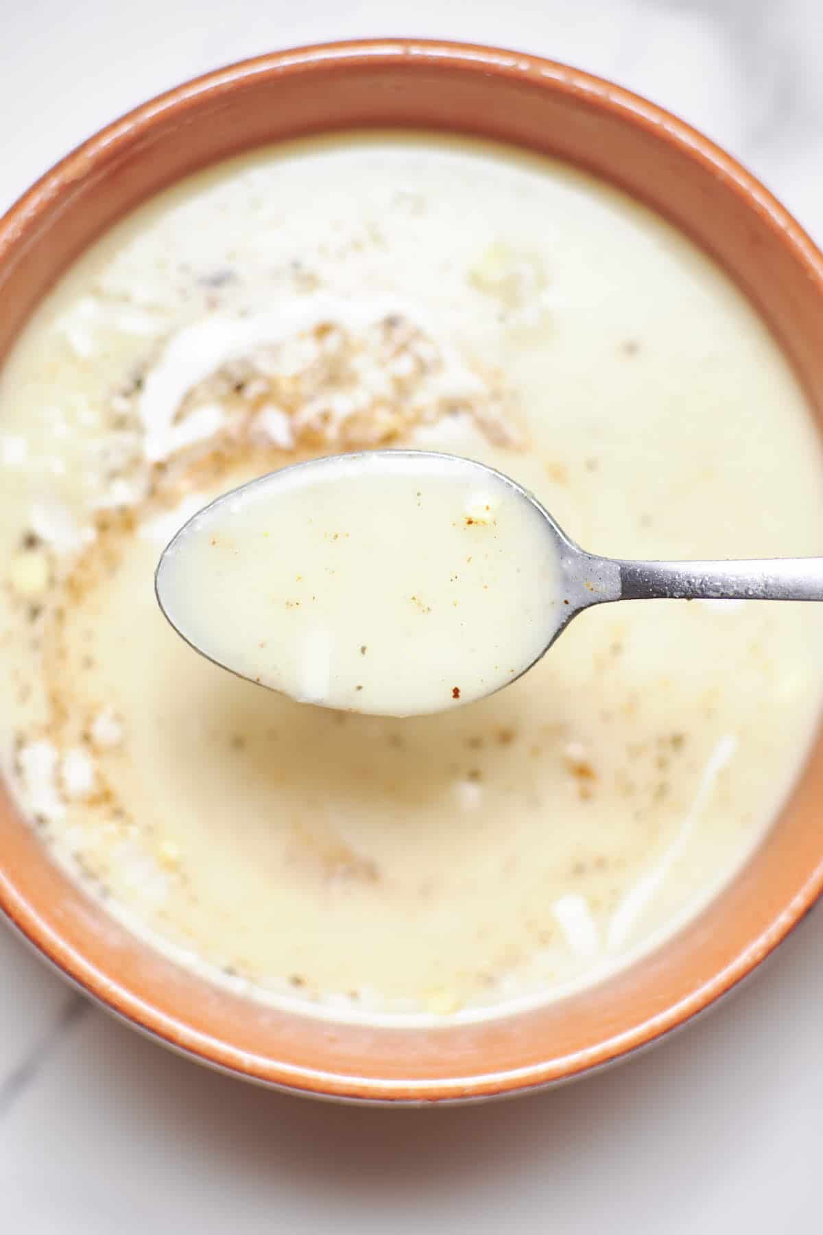 3-ingredient potato soup and a spoon 