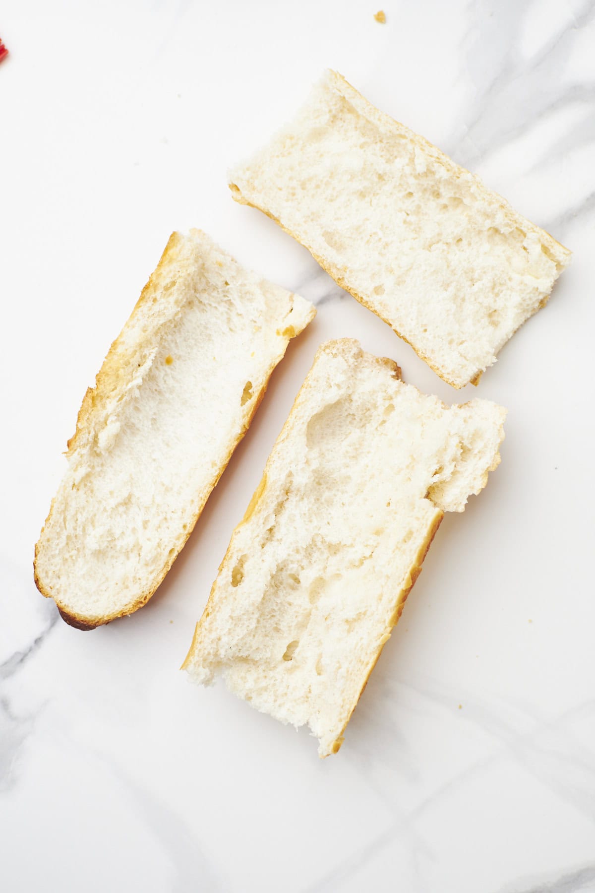 loaf of french bread, halved, and sliced down the middle, cut sides up.