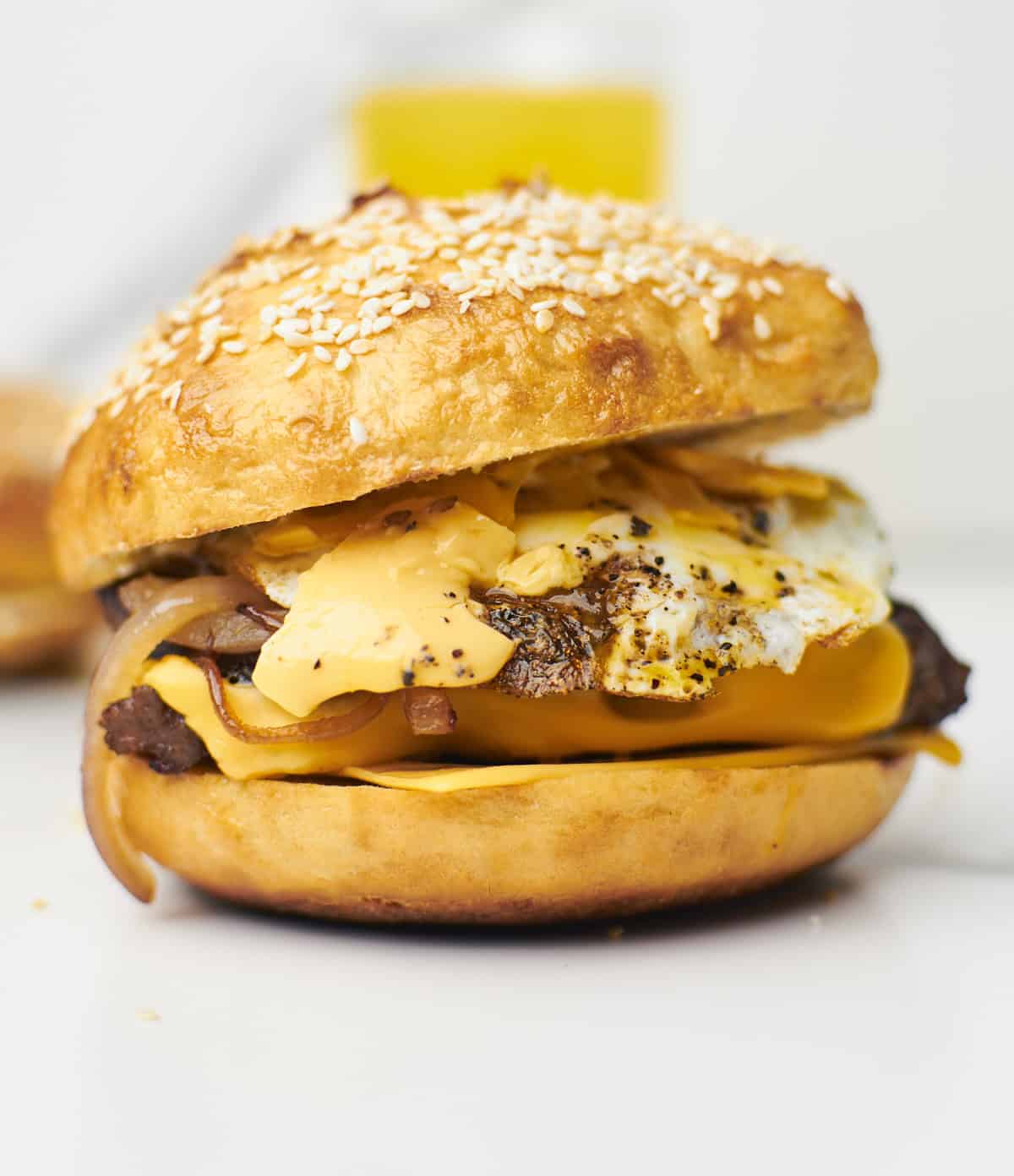 Close up of steak egg and cheese bagel sandwich.