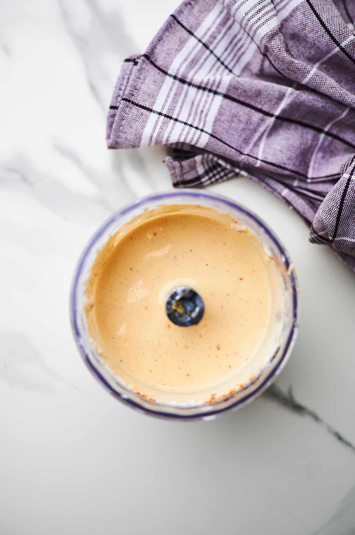 Blending cottage cheese pasta sauce.