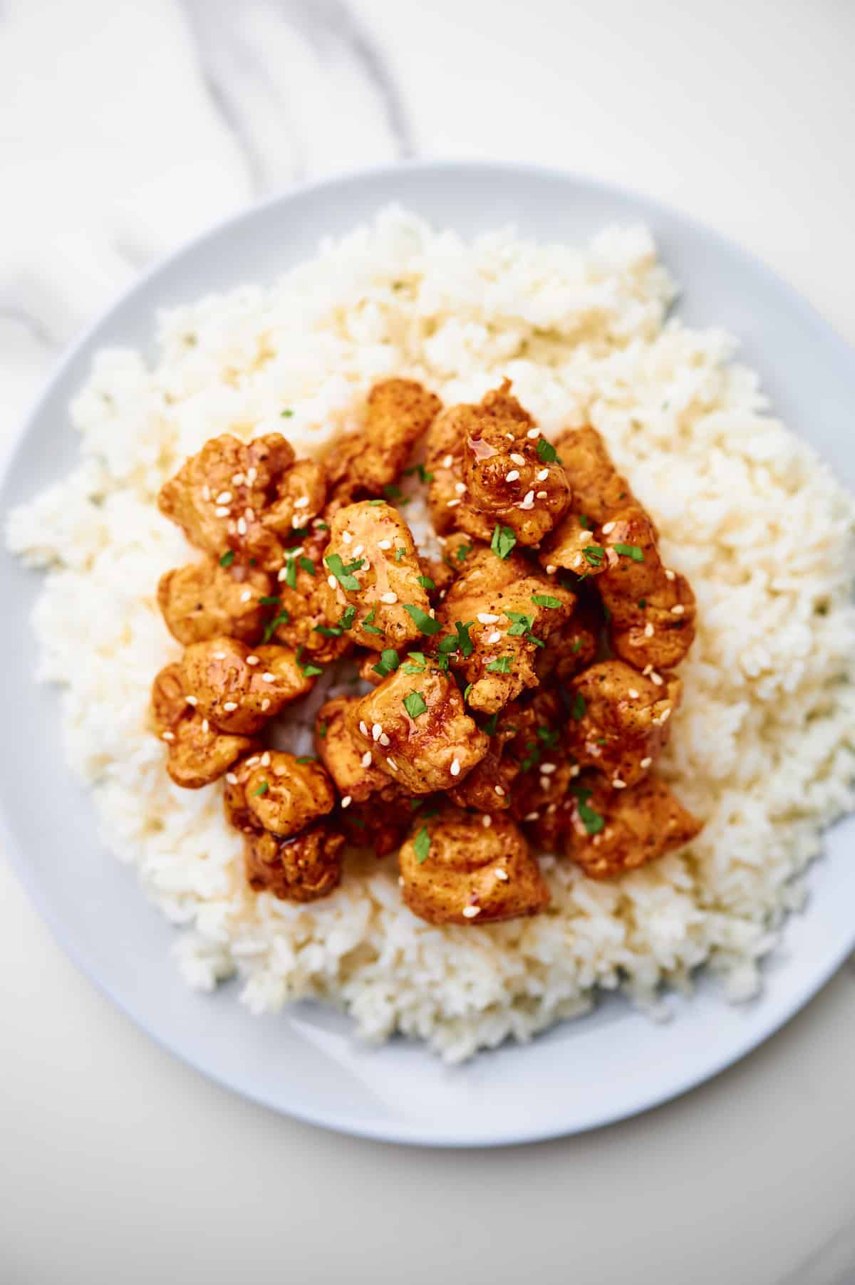 A plate with Crispy Honey Chicken.