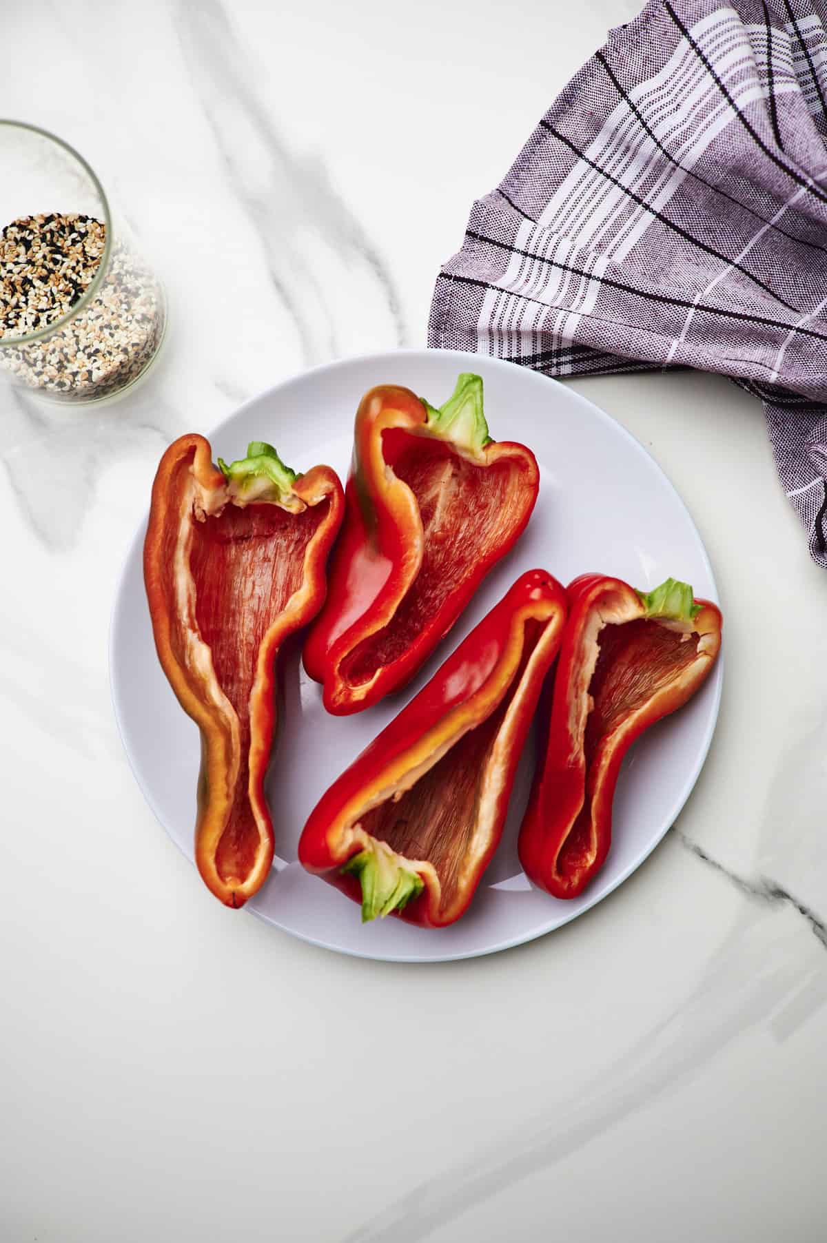 sweet pepper halves on a cutting board