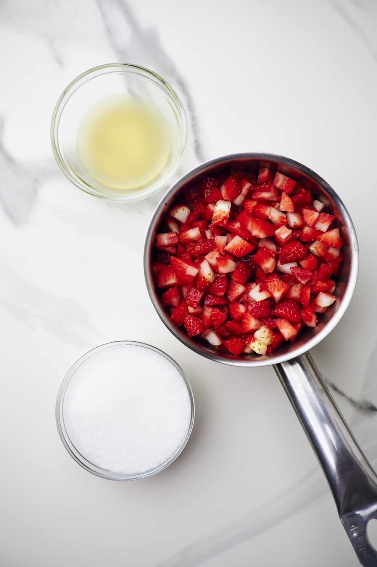 diced strawberries in saucepan.