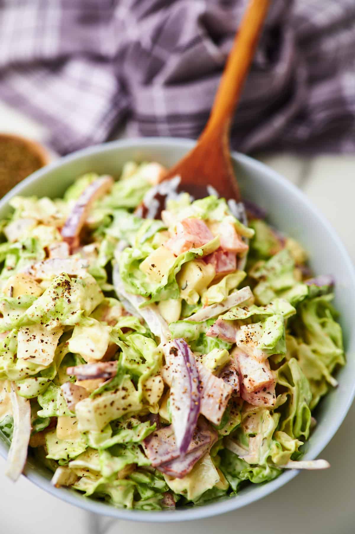 wooden spoonful of chopped Italian salad