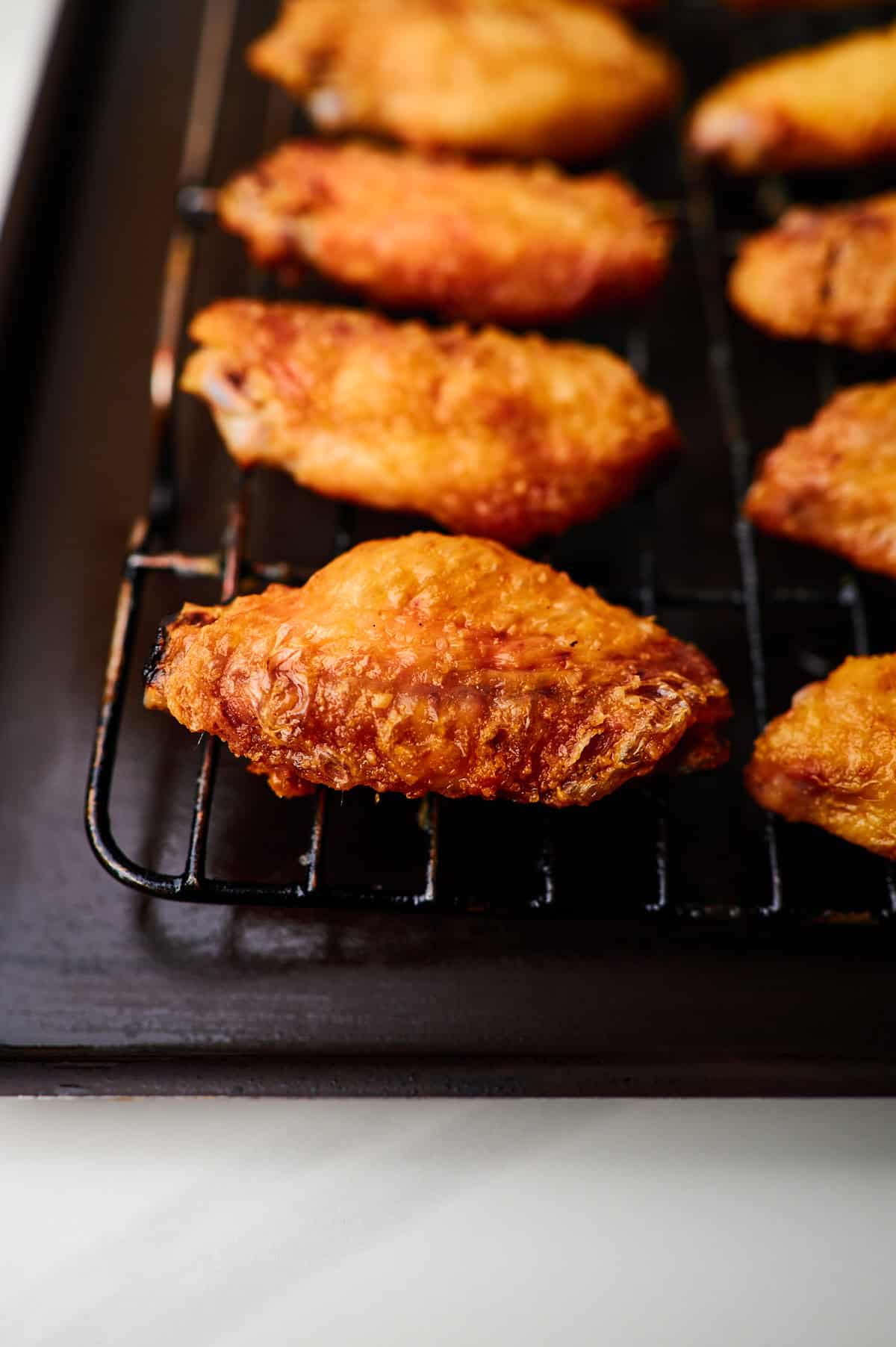 These crispy oven baked wings are so crispy, you will think they've been deep fried! You will be shocked how easy these are to make!